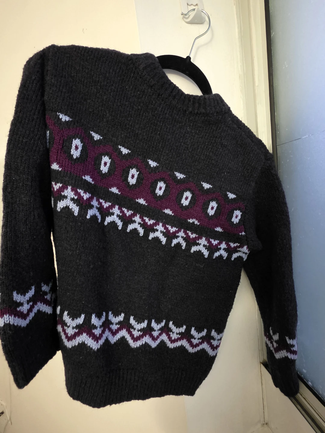 Black patterned knit sweater
