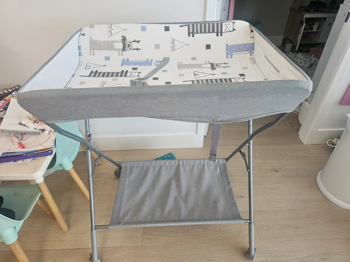 A baby changing table  with storage for baby clother and diaper - photo 2