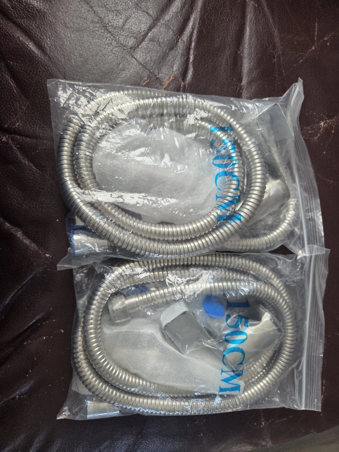 $ 15 each: Two 150cm Shower Hoses