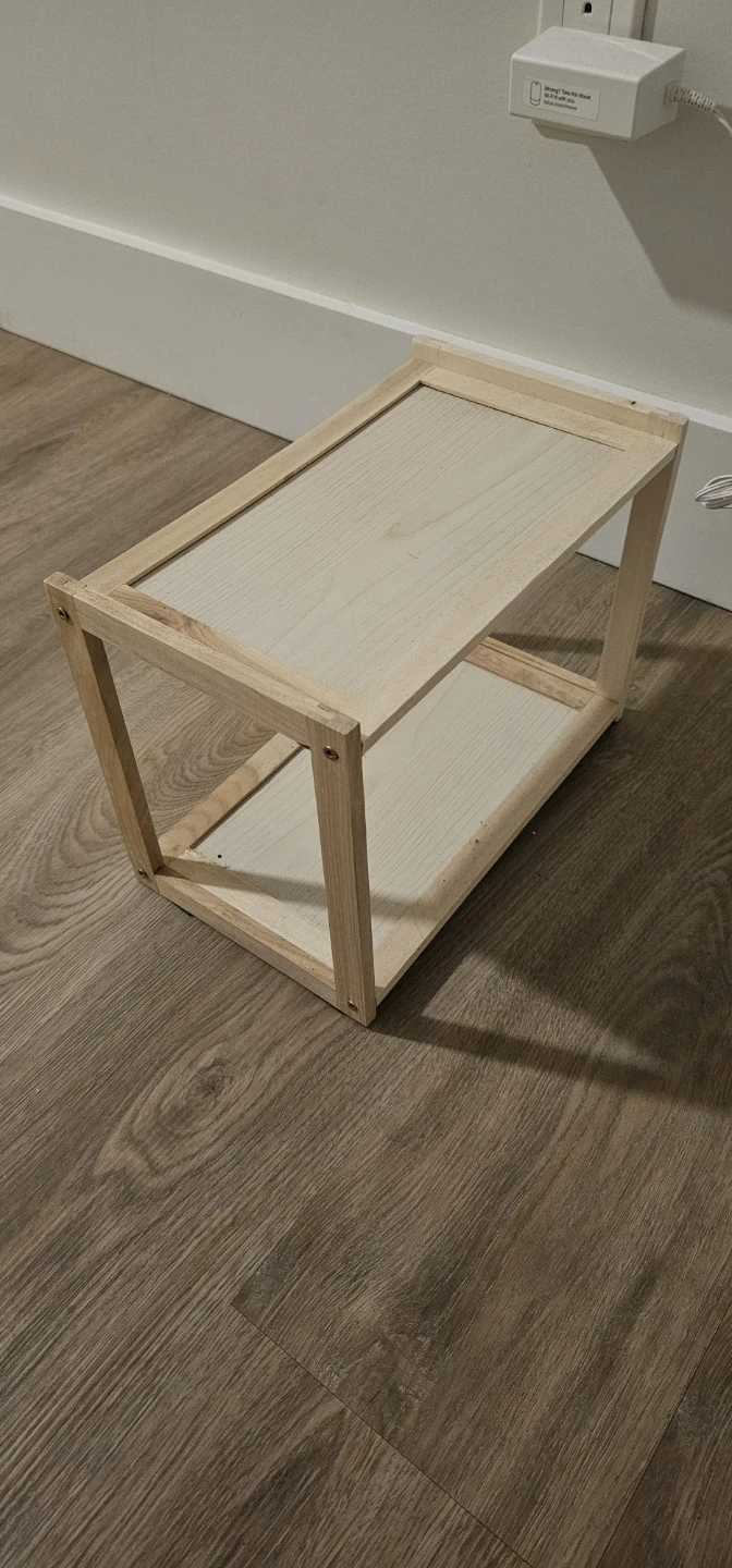 Small wooden two-tier shelf