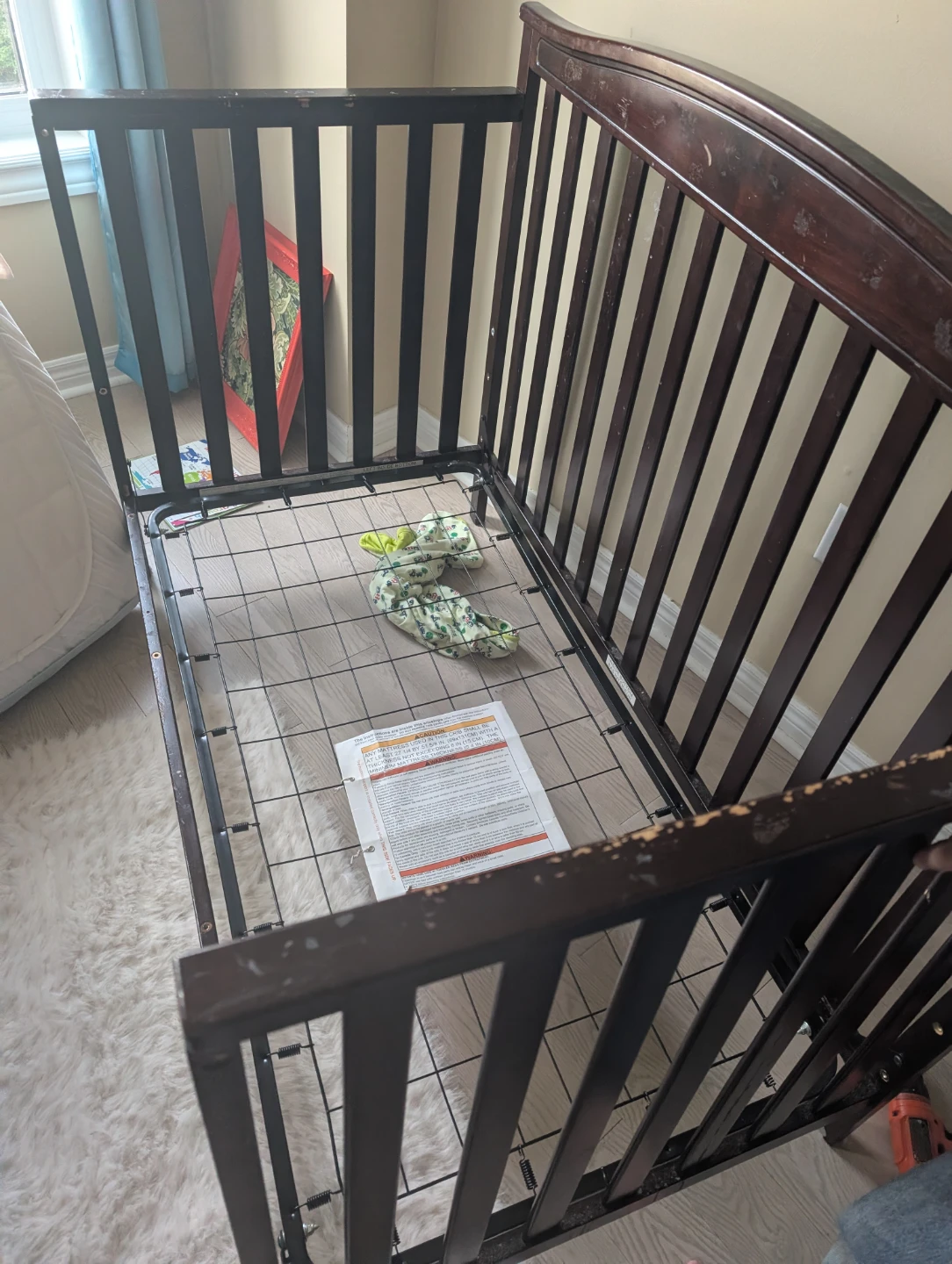 Dark brown wooden baby crib has marks - photo 4