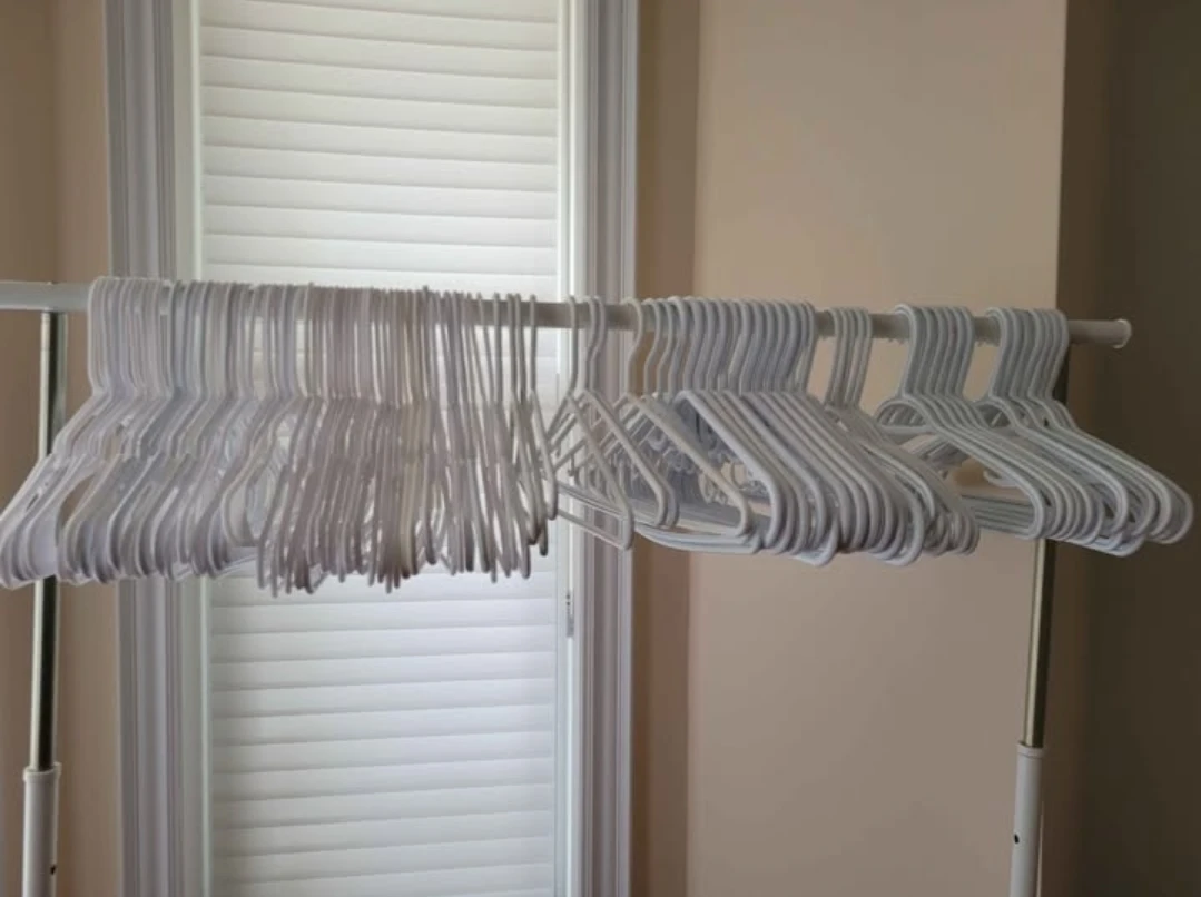 $0.20 plastic hanger $1 wood hanger and coat hanger - photo 2