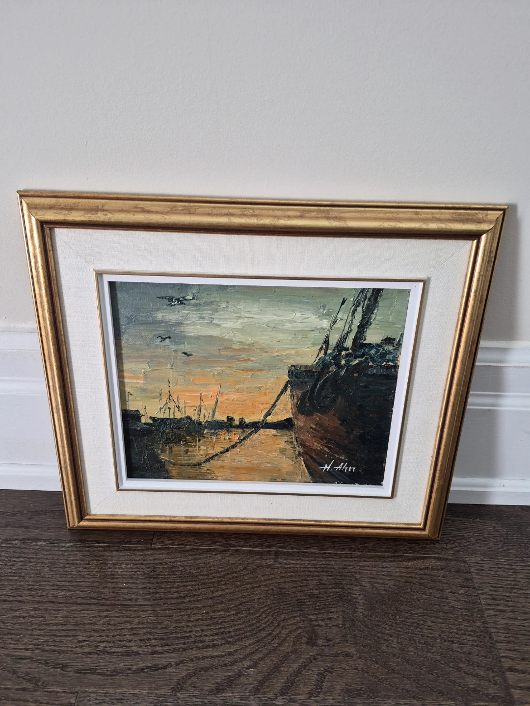 Framed Oil Painting of a Harbour Scene at Sunset