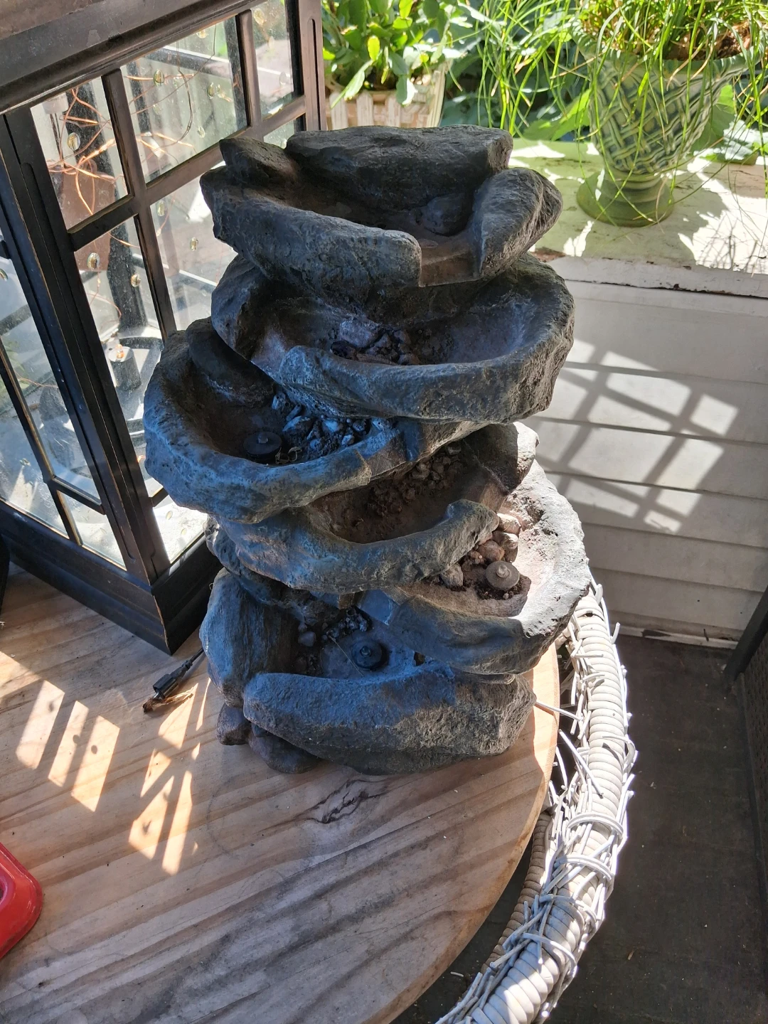 Stone-look tiered water fountain