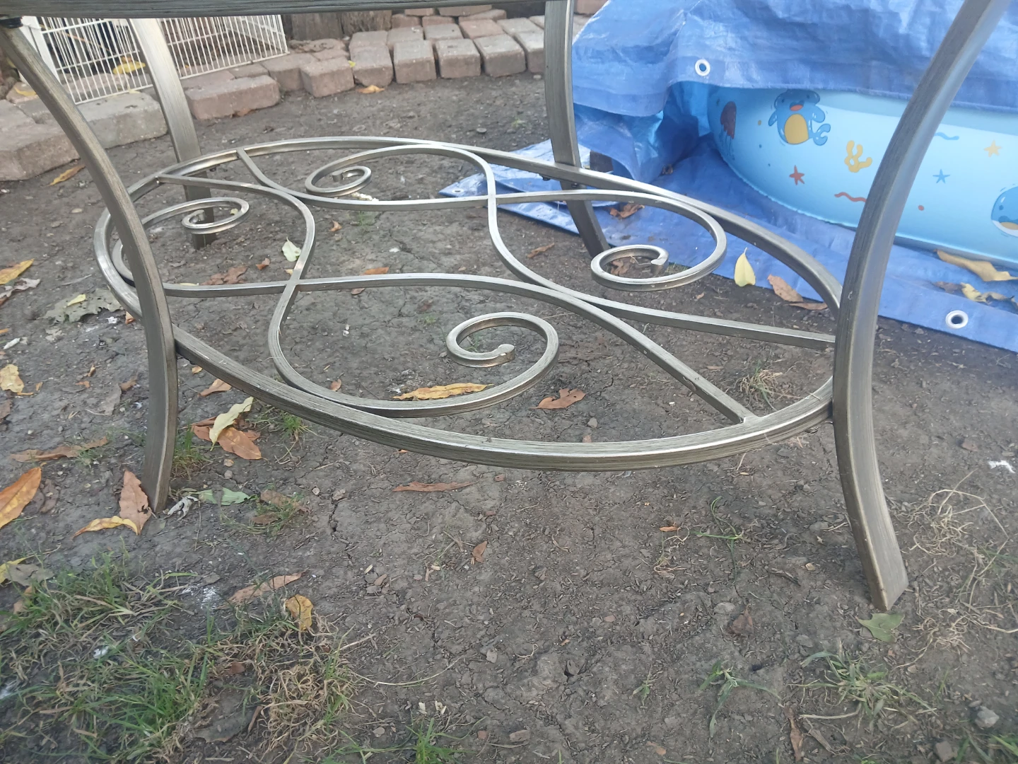 Oval Glass Coffee Table with Metal Scrollwork Base - photo 3