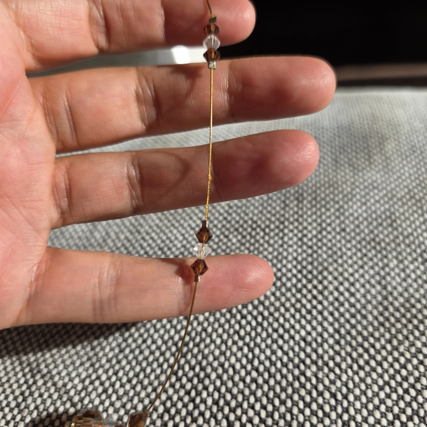 Delicate beaded necklace with crystal pendant - photo 4