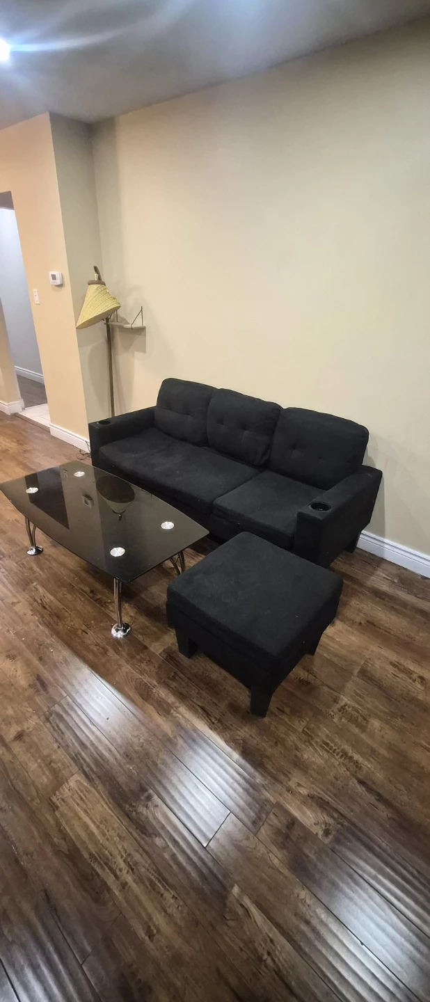 Black Sofa with Matching Ottoman