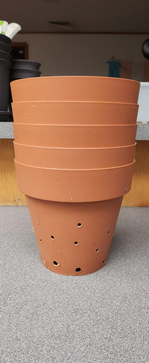 Set of 5 Terra Cotta Coloured Plastic Pots