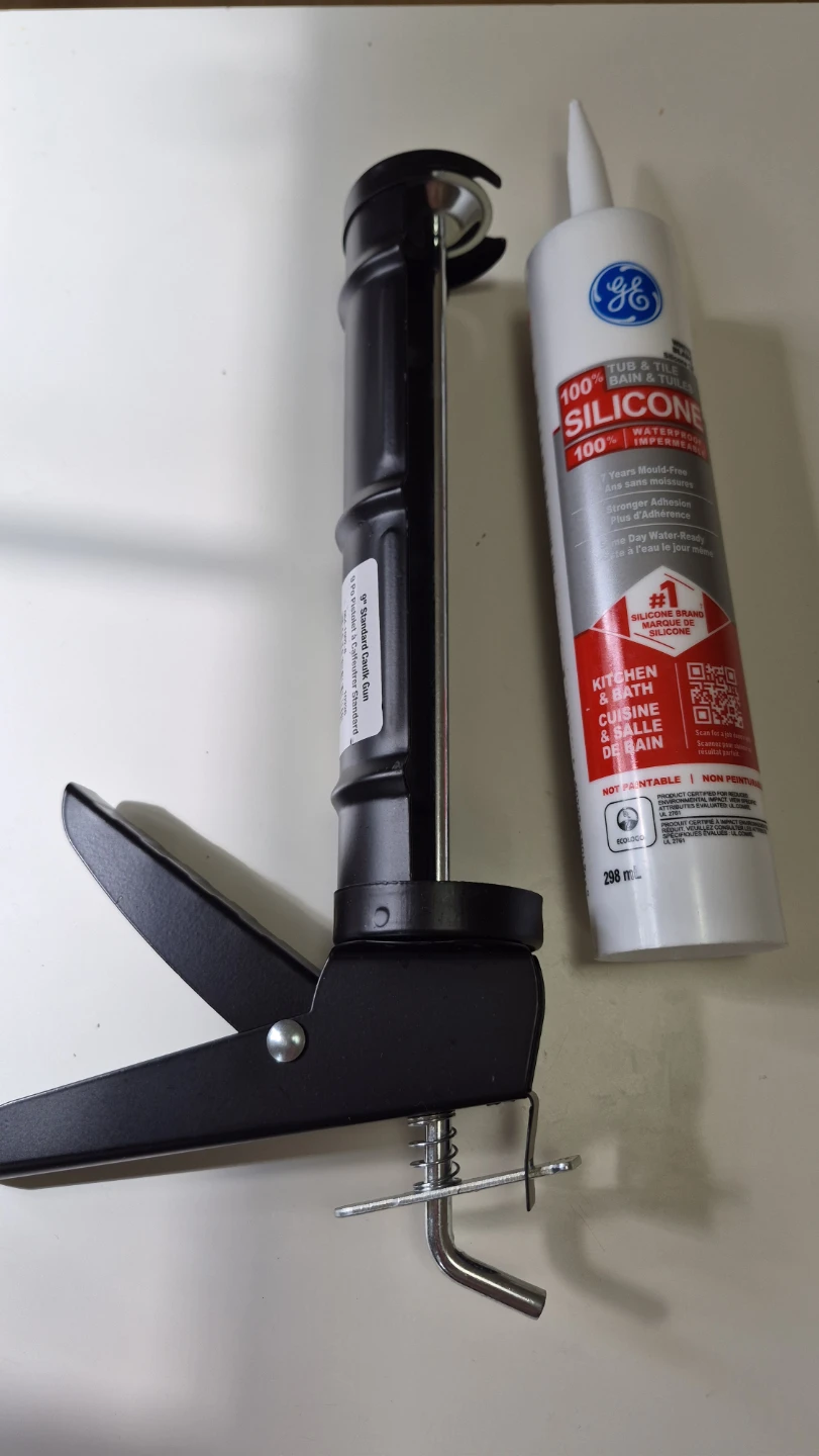 9" Standard Caulk Gun and GE Silicone