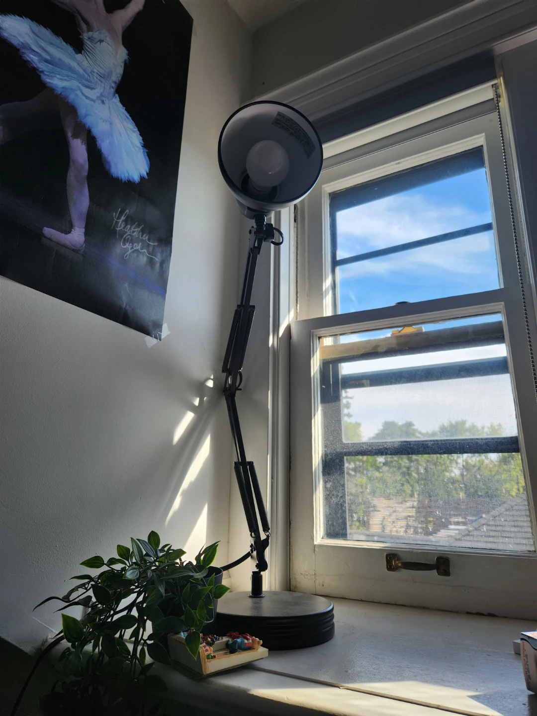 Black adjustable swing arm desk lamp