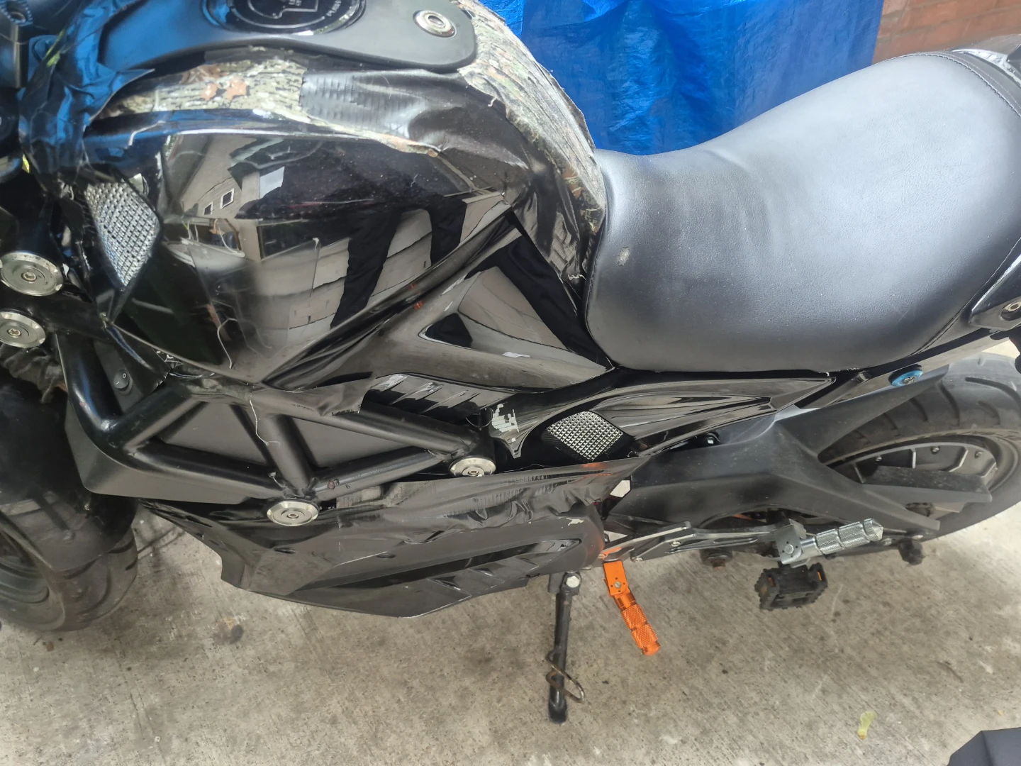 Electric motorcycle with hand brake lever