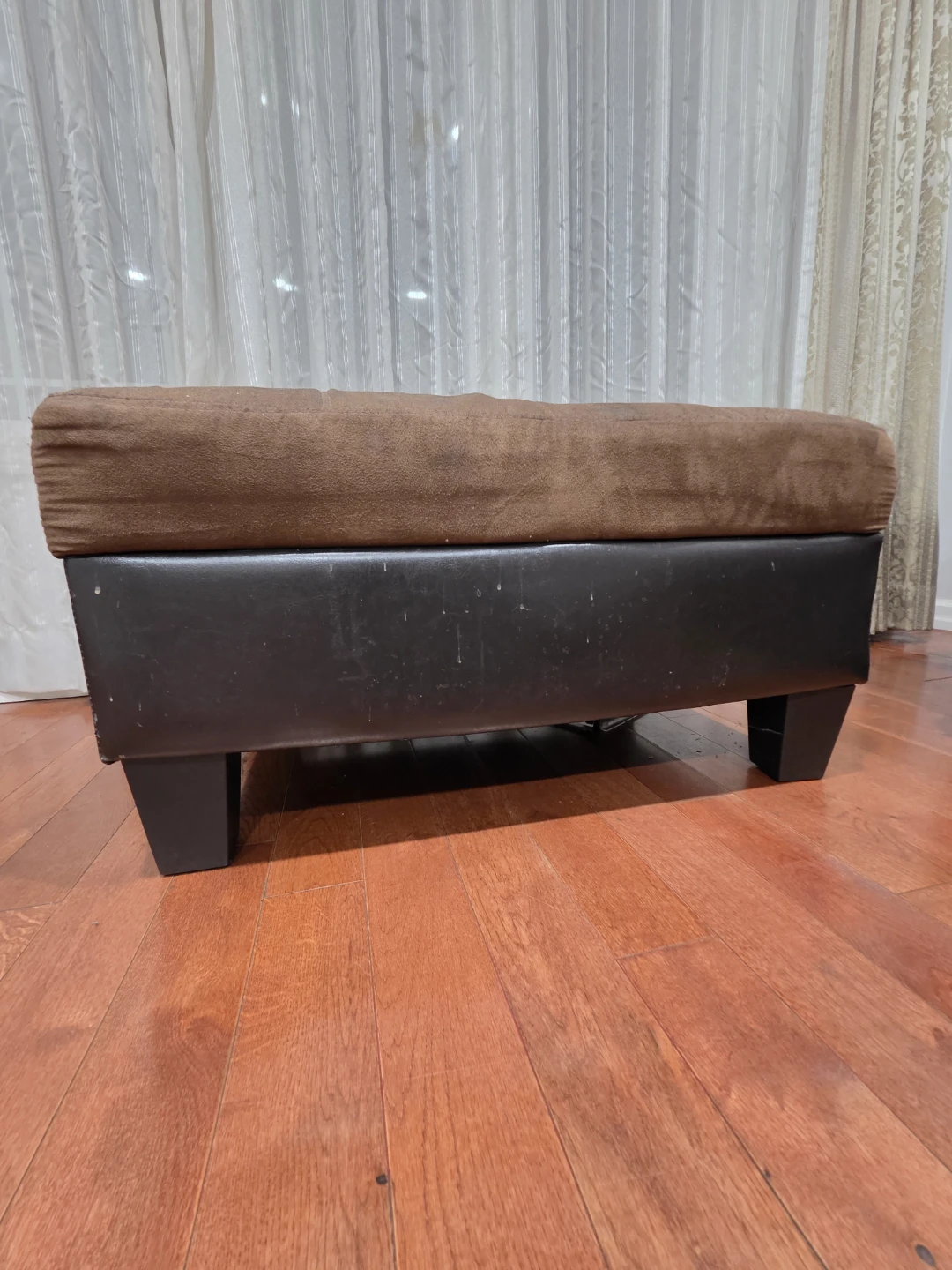 Brown and black ottoman