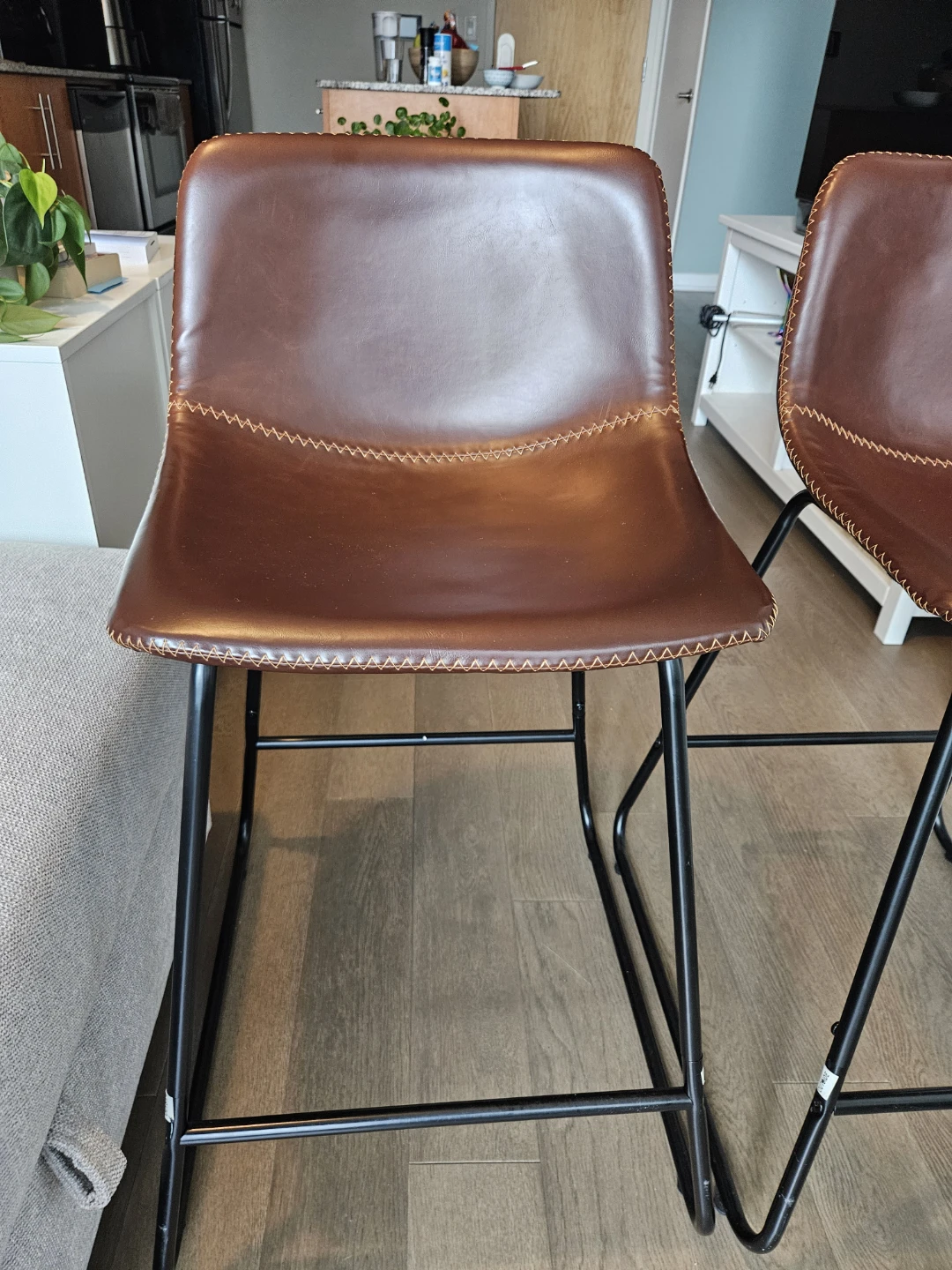 Two Brown Faux Leather Bar Stools