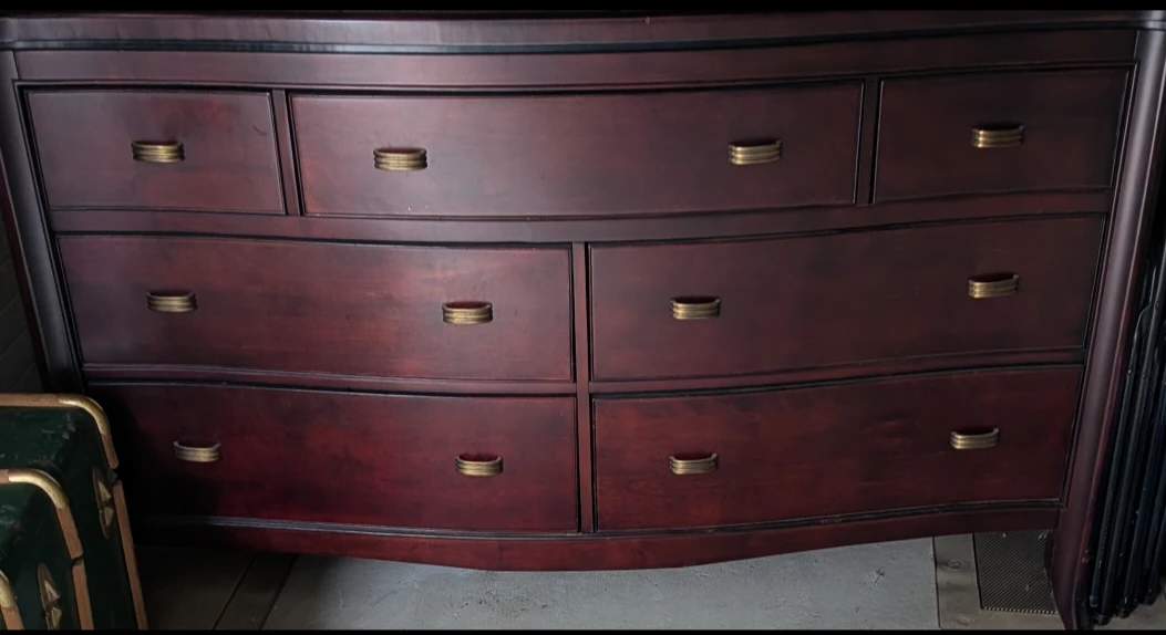 Large dark wood dresser with nine drawers