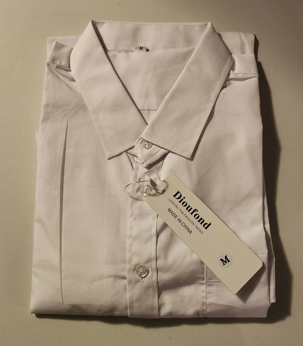Dioufond white button-down shirt 🏈