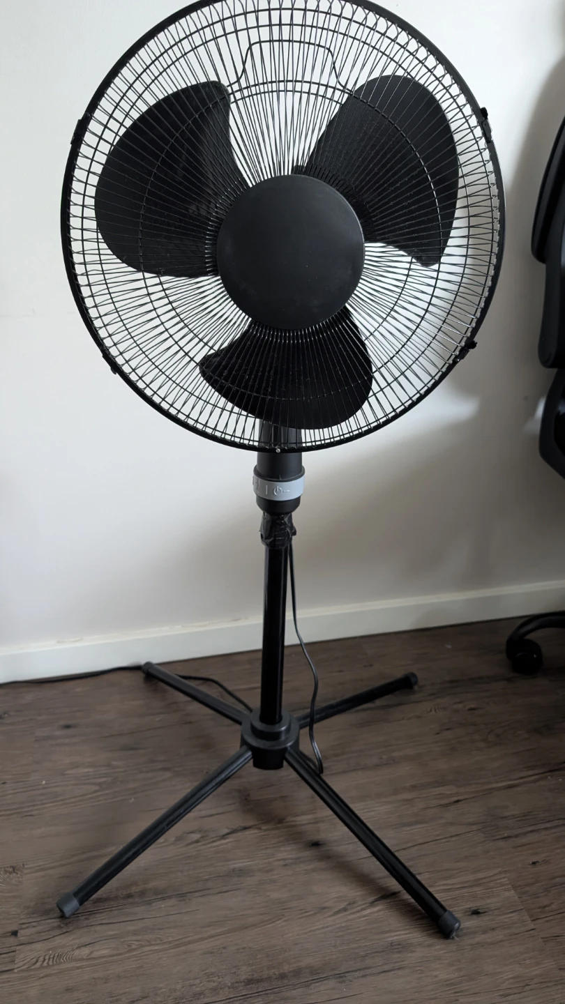 Black pedestal standing fan