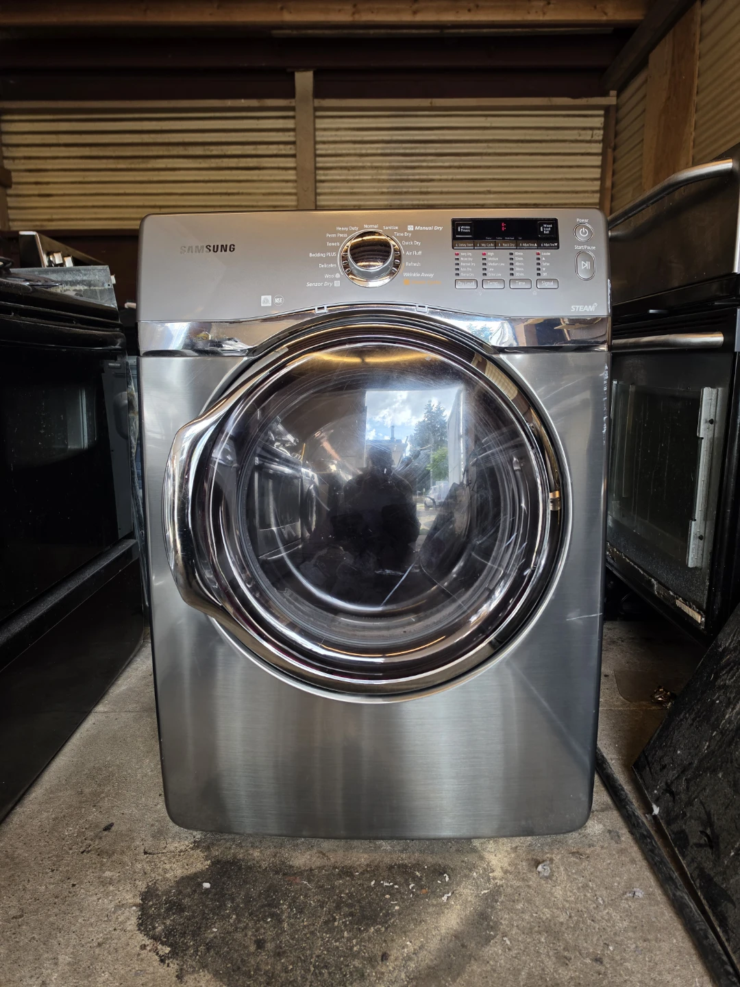Delivery Available - Samsung SteamDry 7.4 cu. ft. Front Load - photo 2