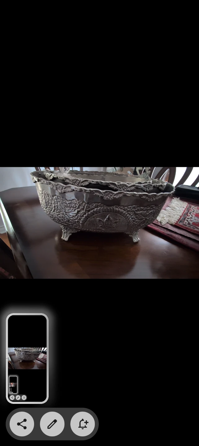 Ornate silver-tone decorative bowls