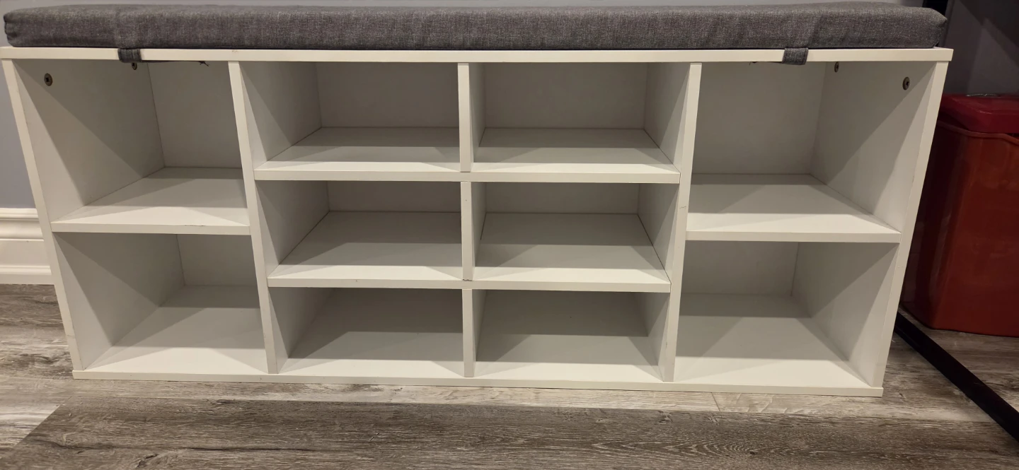 White shoe storage bench with grey cushion