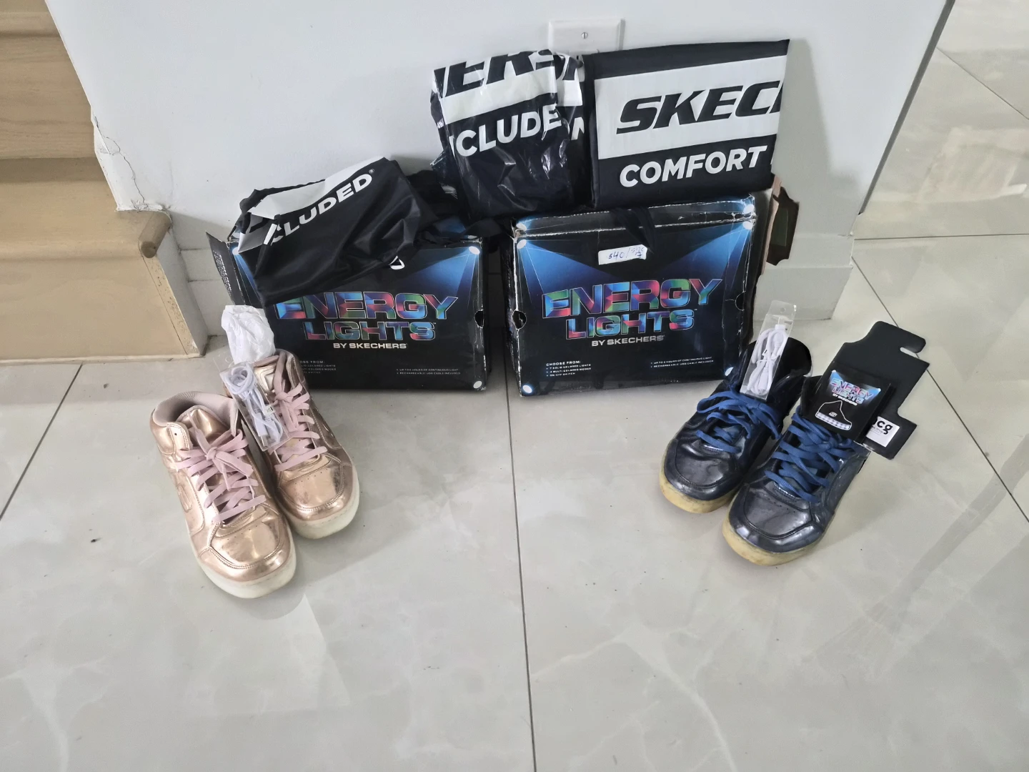 Two pairs of Skechers Energy Lights sneakers