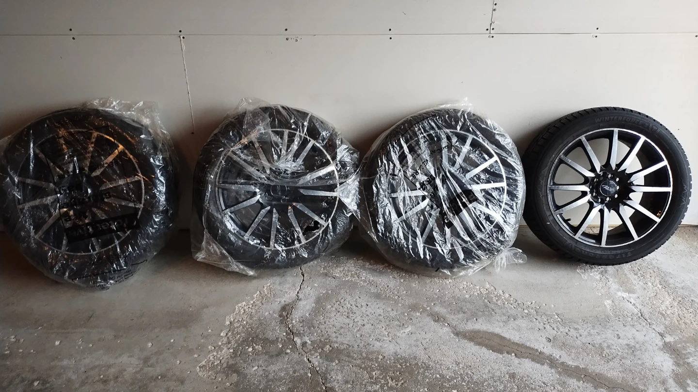 Set of 4 Firestone Winterforce Tires with Rims