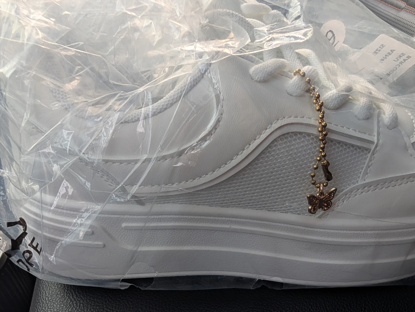 White Sneakers with Butterfly Charm