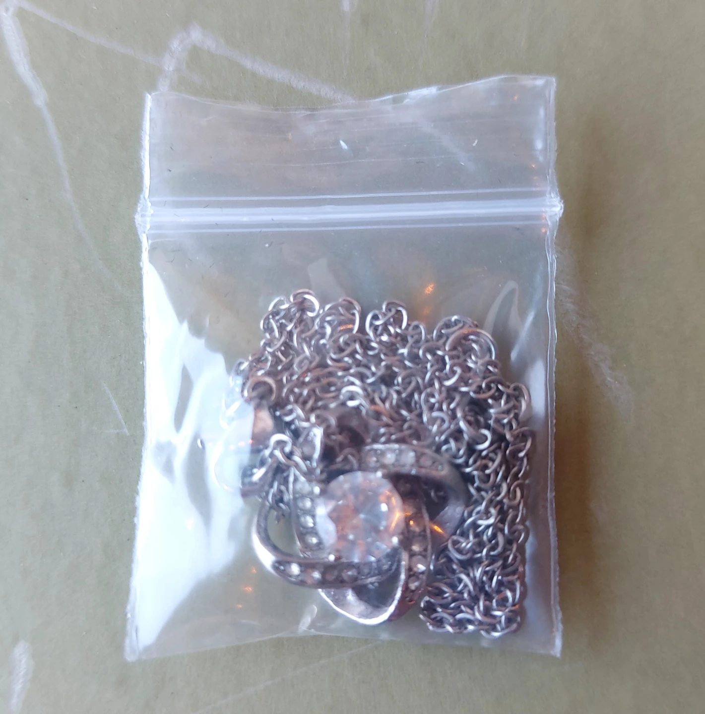 Silver tone crystal pendant necklace