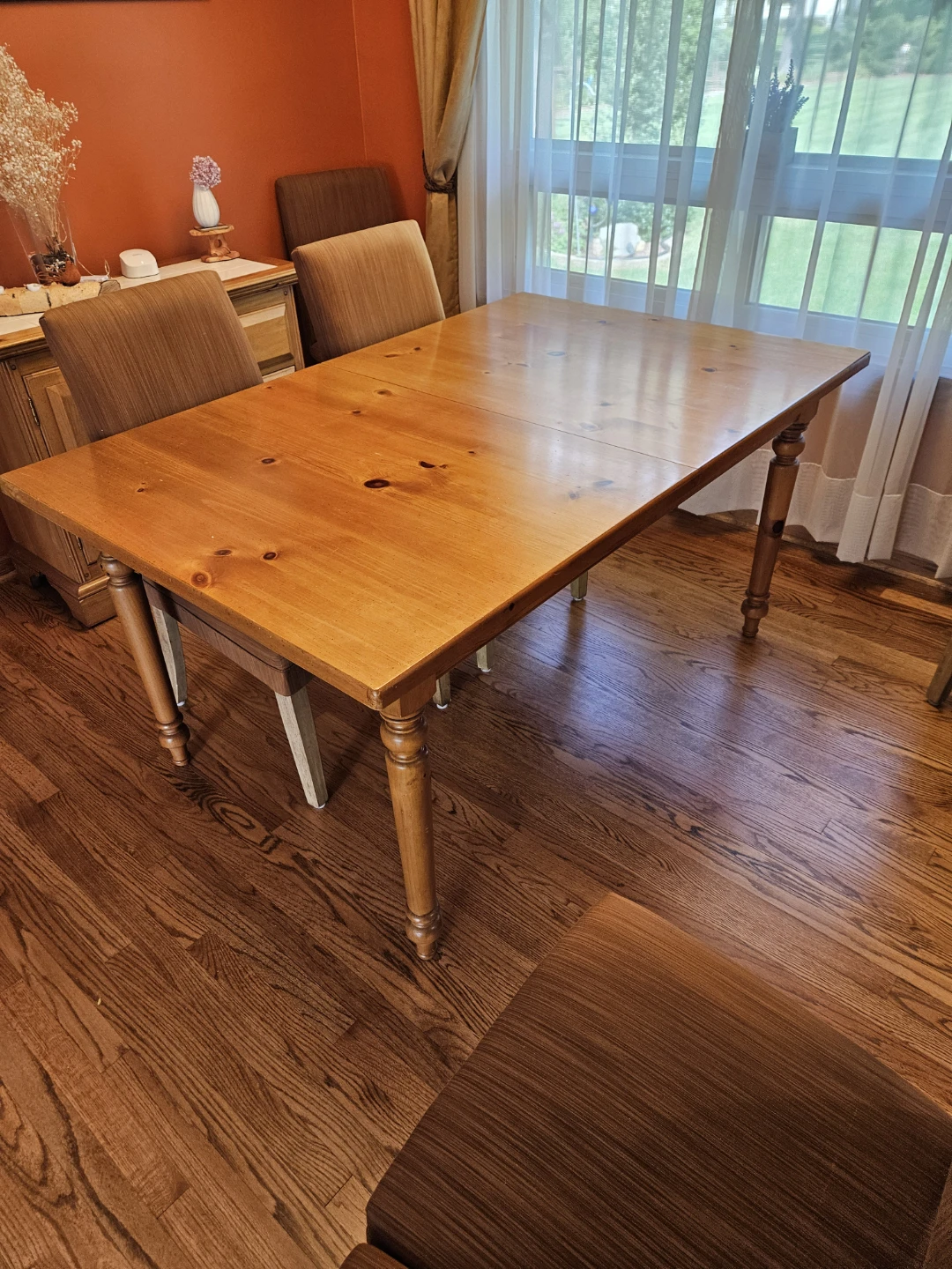 Rustic Pine Dining Table with Brown Fabric Chairs