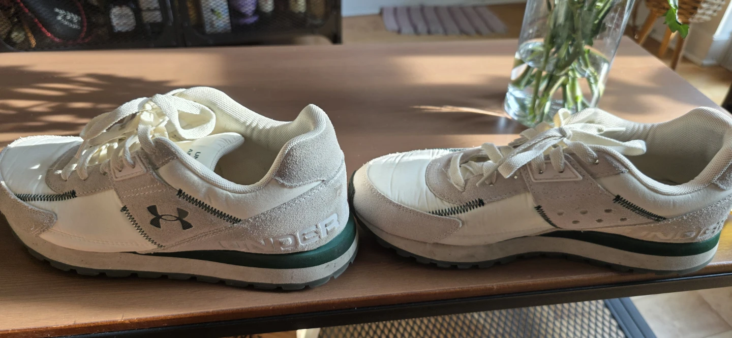 Under Armour cream and green sneakers