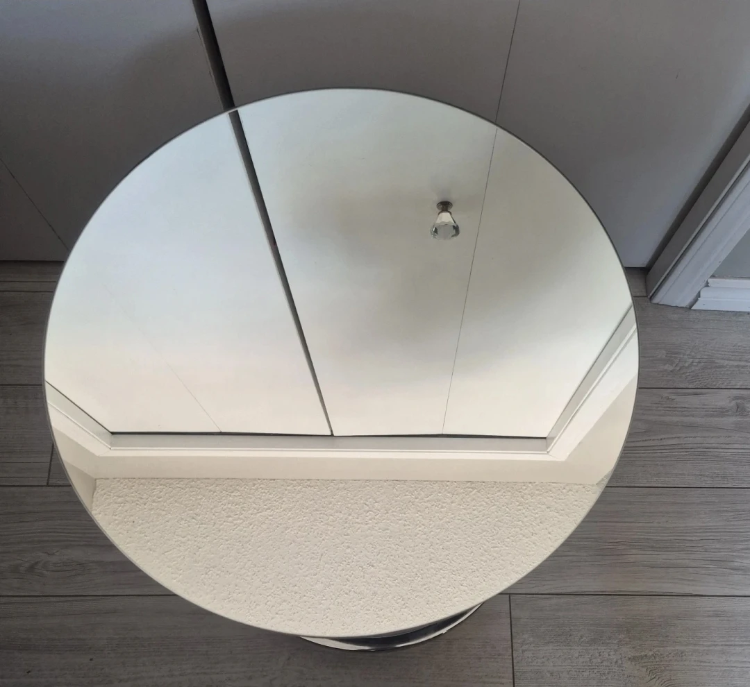 Round chrome and glass side table
