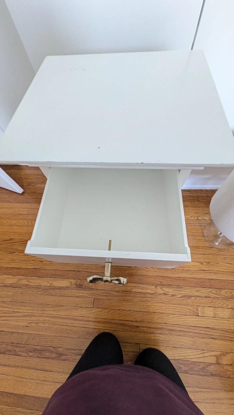 White storage cabinet with gold bow hardware - photo 3