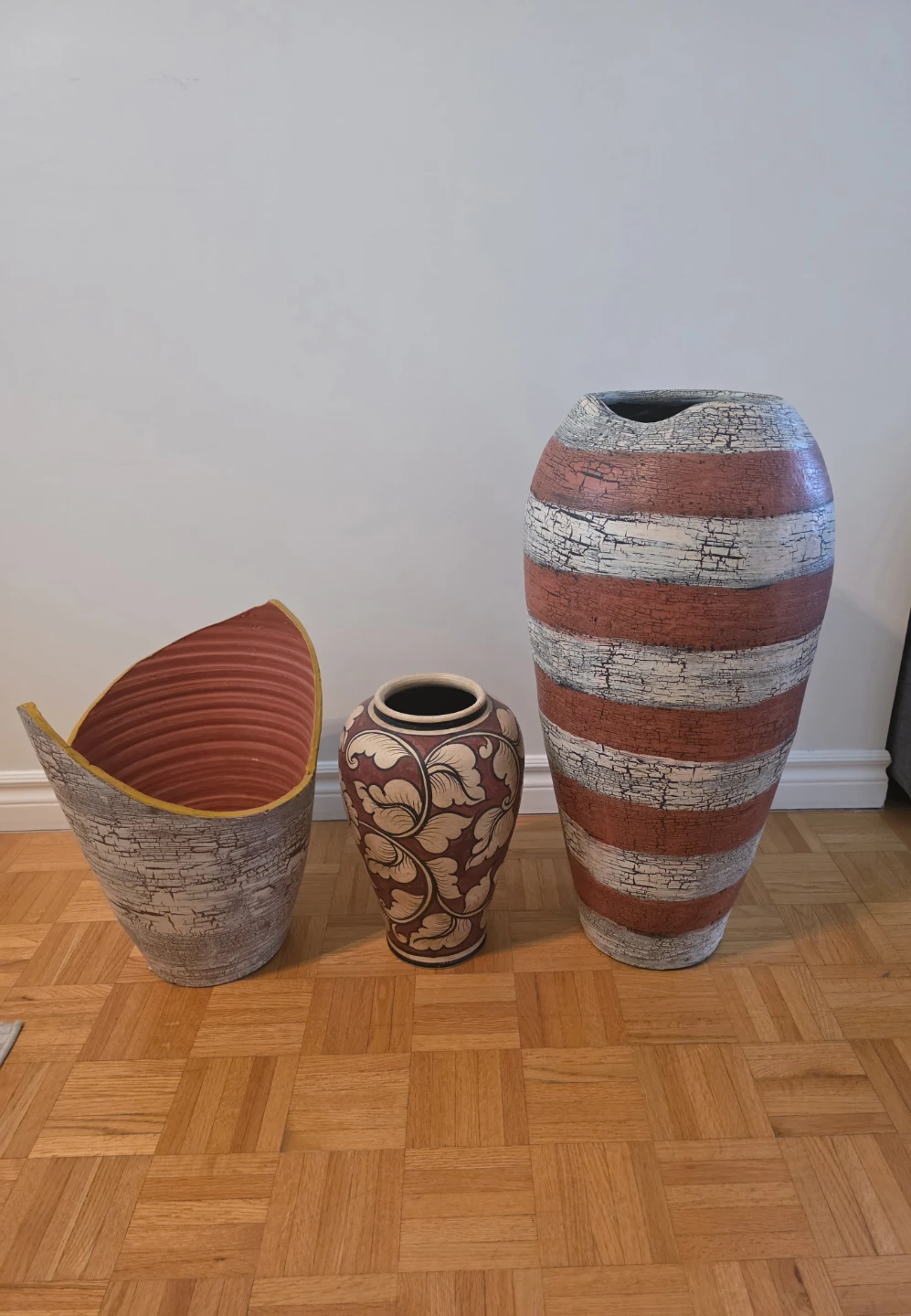 Three decorative ceramic vases