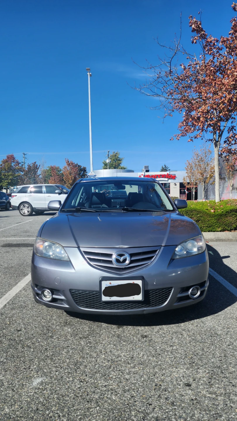 Grey Mazda 3 2006