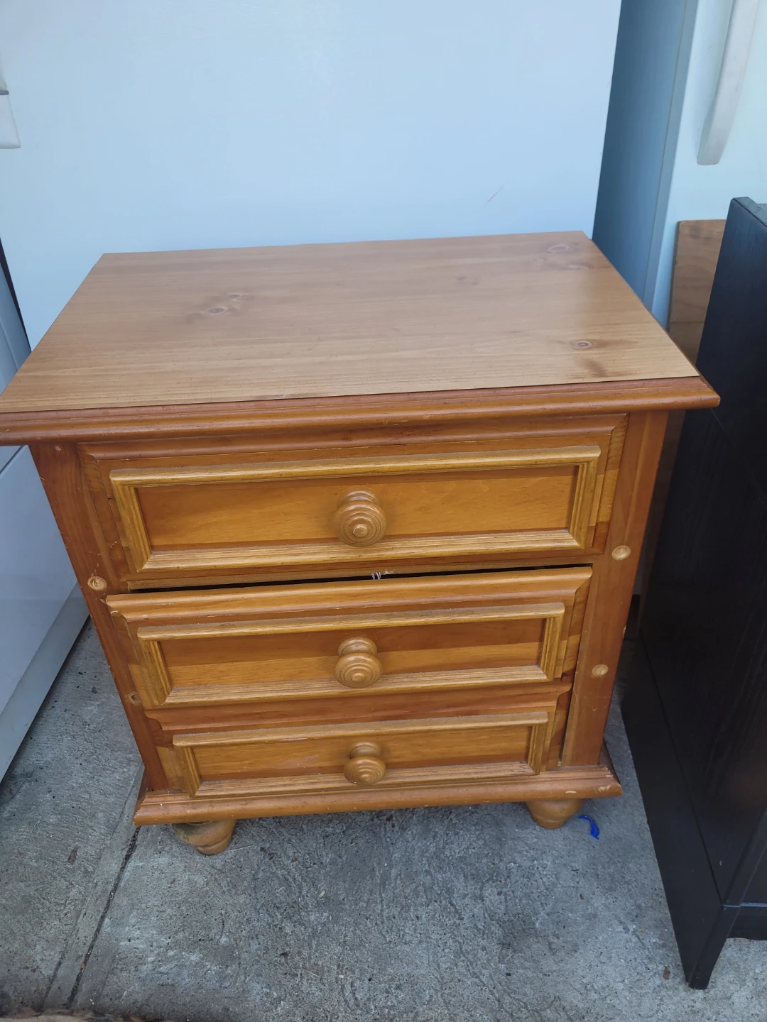 Wooden nightstand with 3 drawers