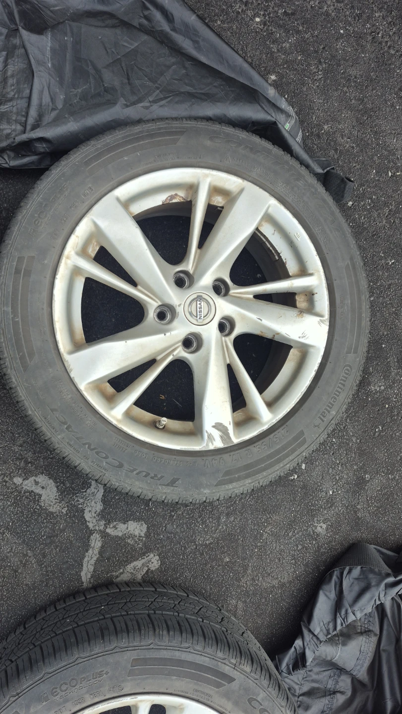 Set of 4 Nissan 17-inch OEM Wheels & Tires (with TPMS)