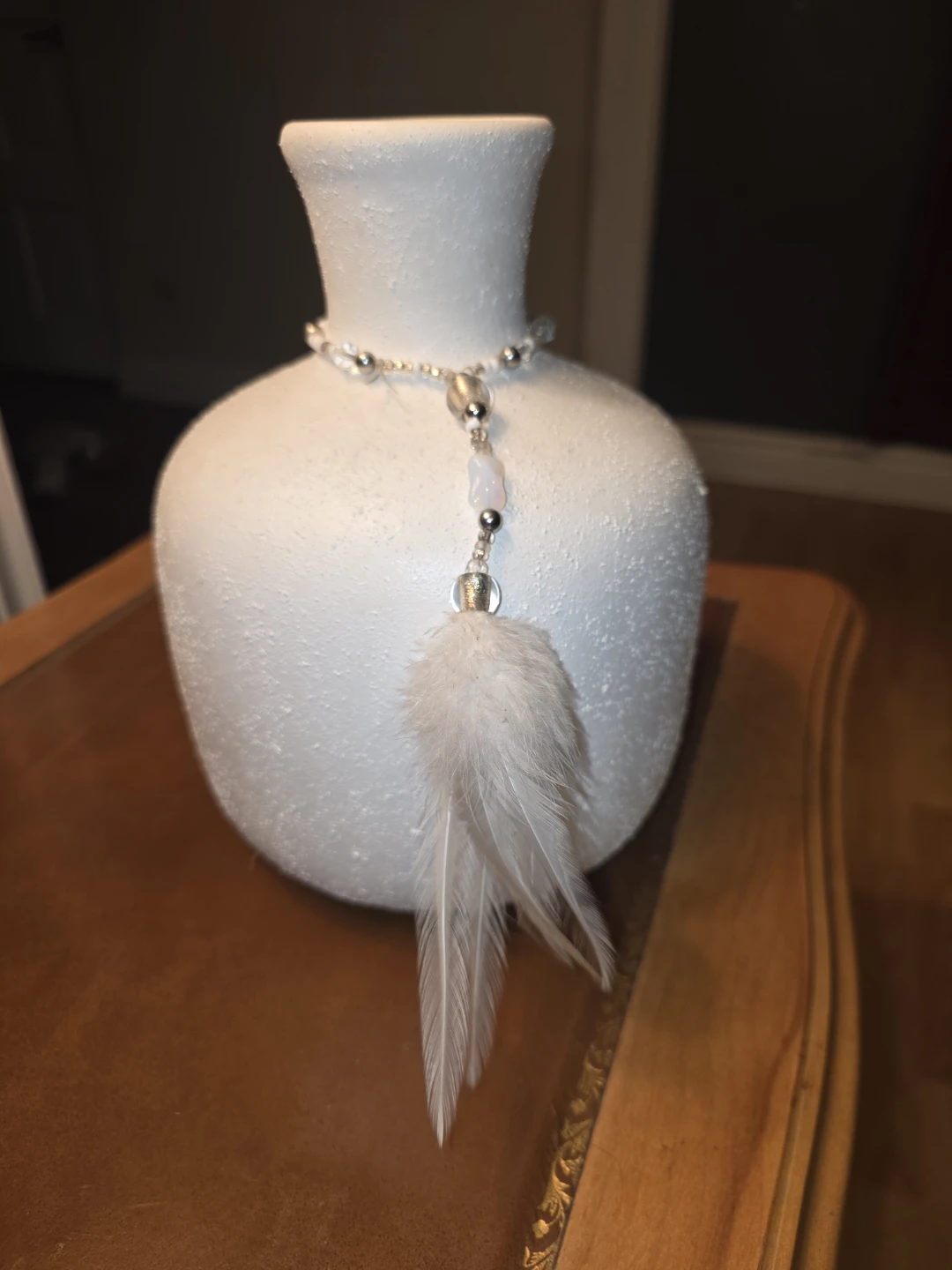 White textured vase with beaded decoration