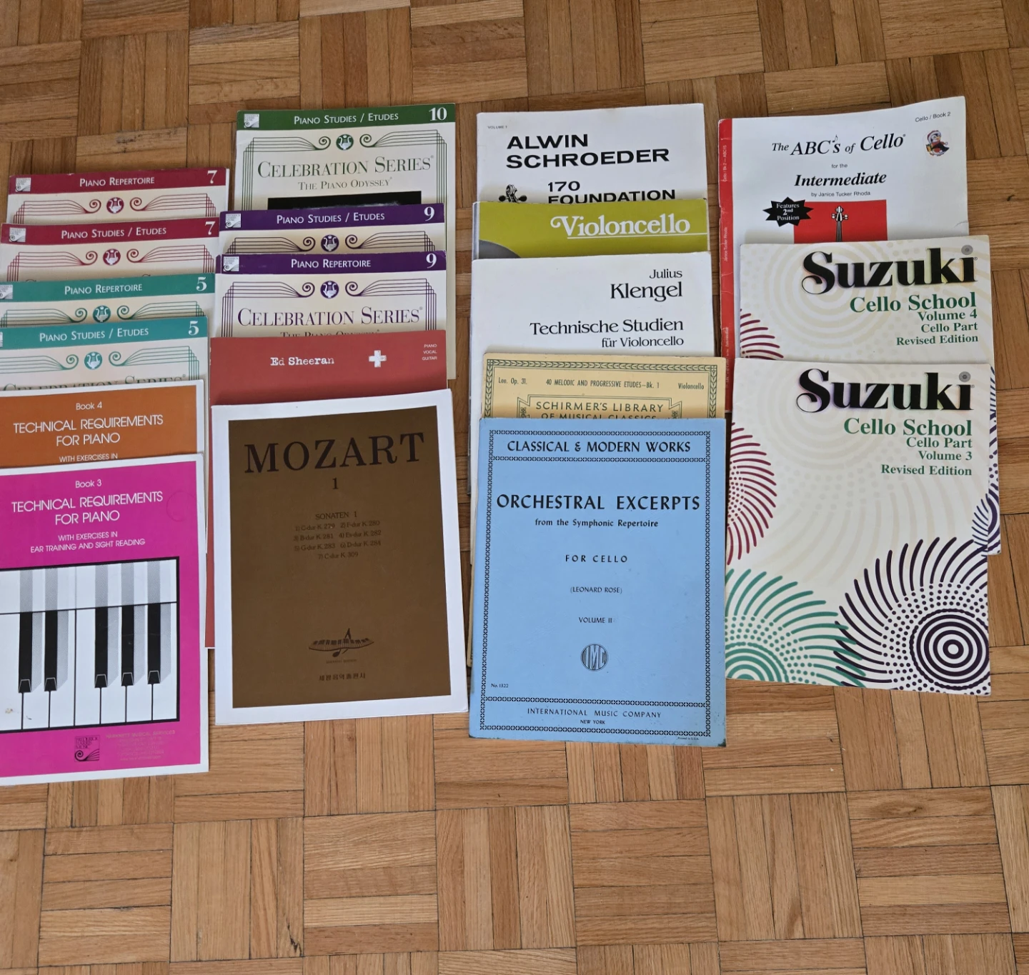 Collection of Piano and Cello Music Books