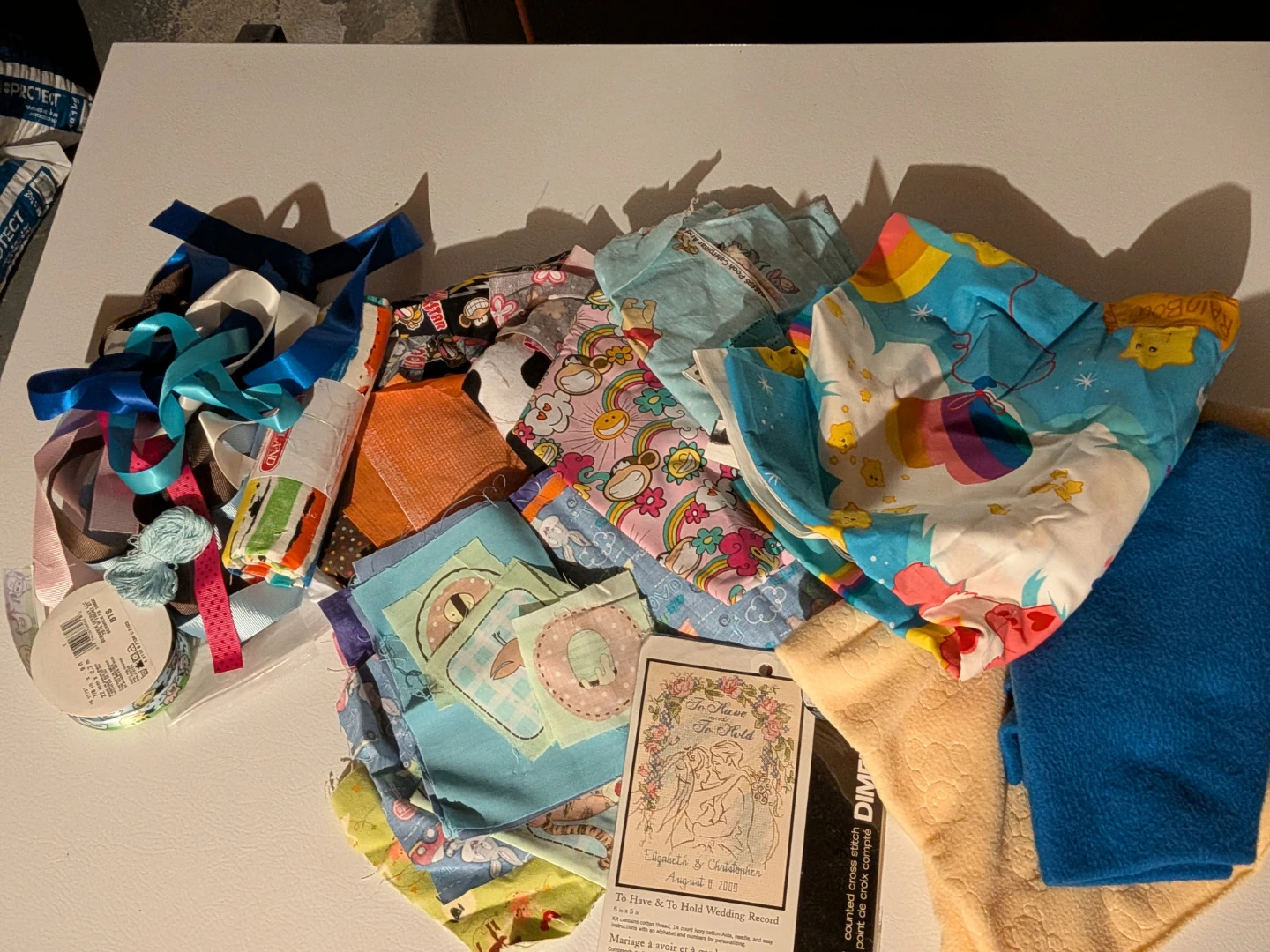 Assorted Crafting Supplies and Fabric Remnants