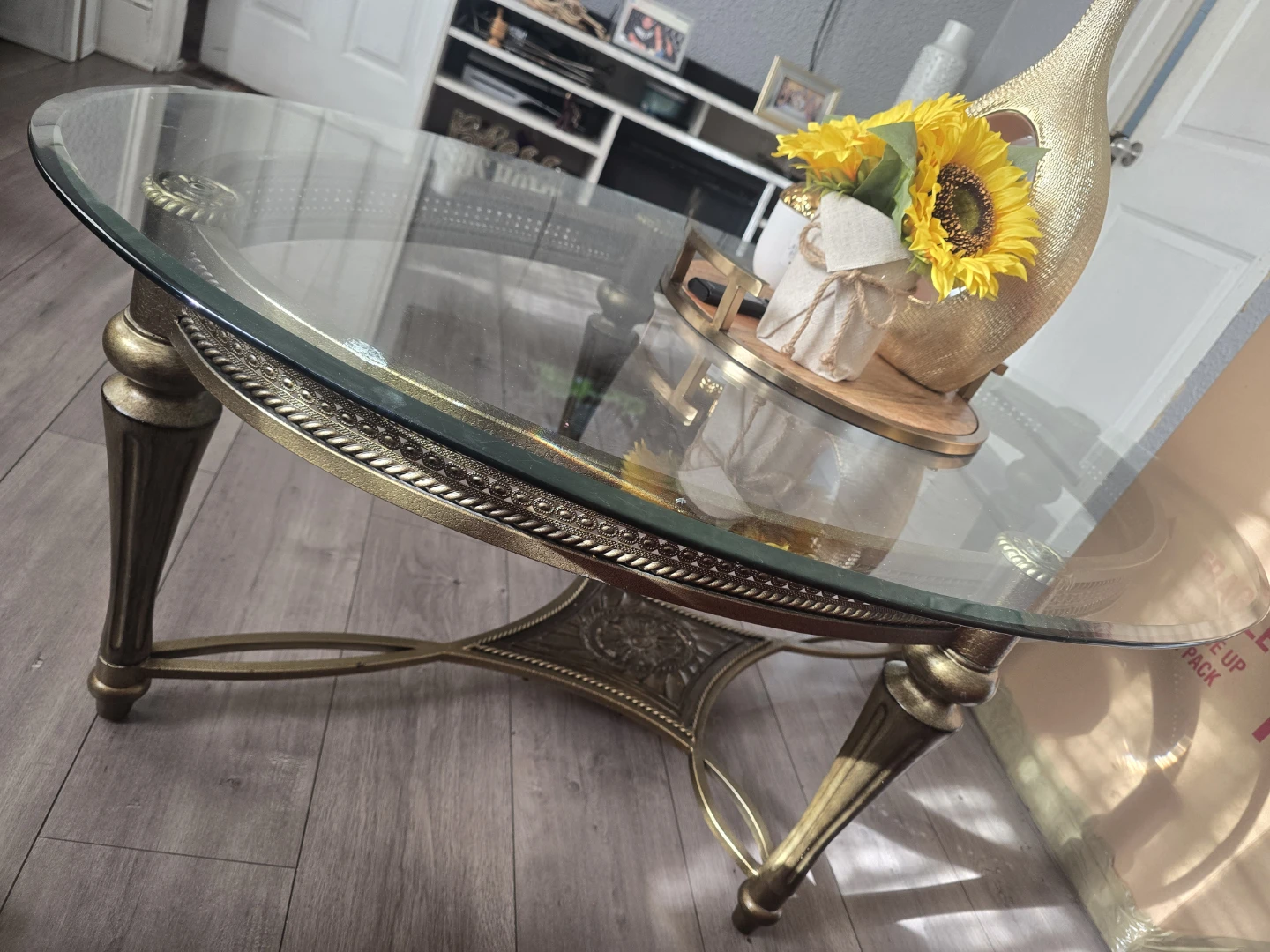 Oval Glass Coffee Table with Gold Tone Base