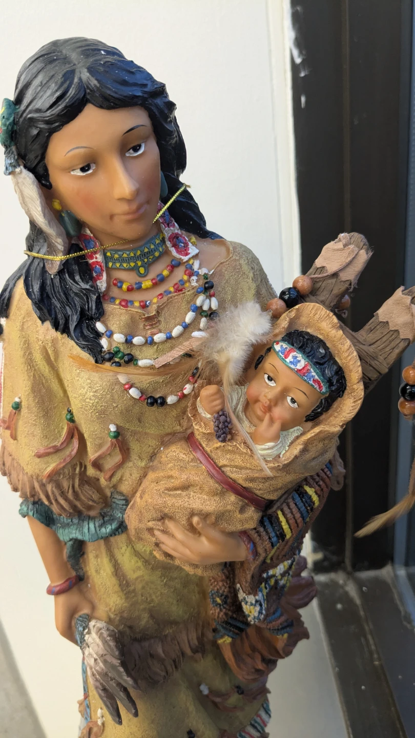 Beautiful mother and son figurine