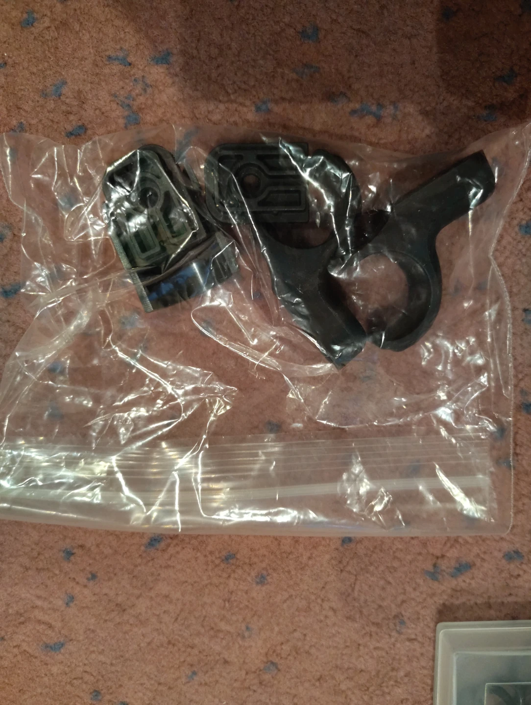 Black plastic mounting hardware set
