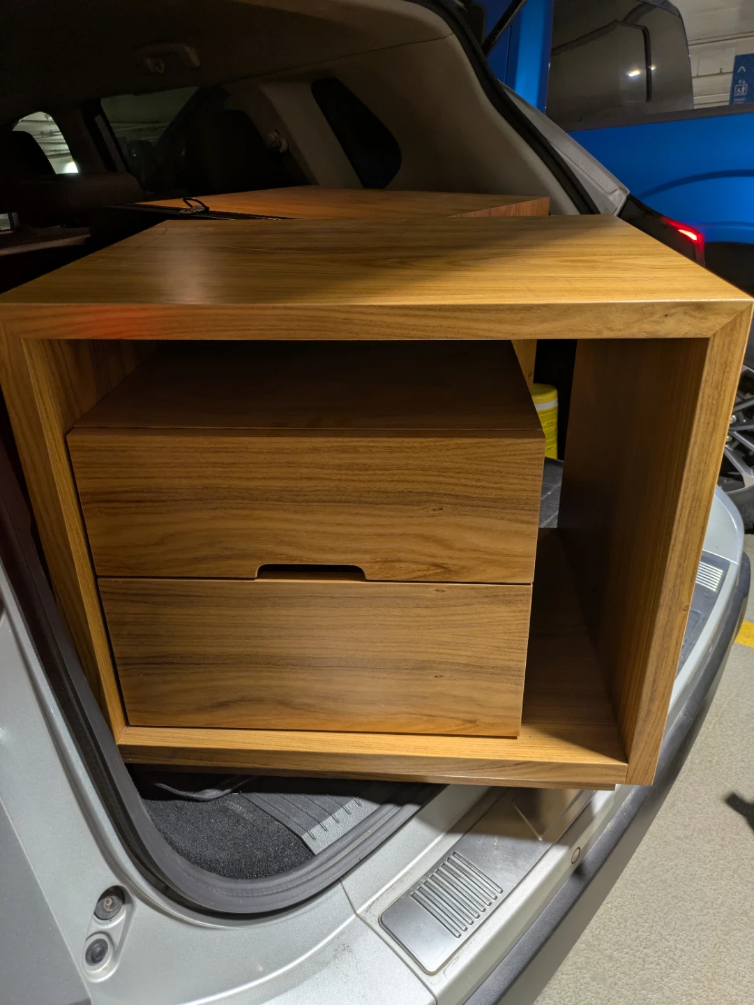 Two wooden side tables
