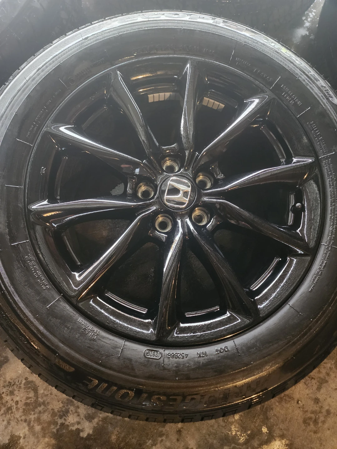 Brand-new 18in. Honda rims and  tires  235 55 R18.