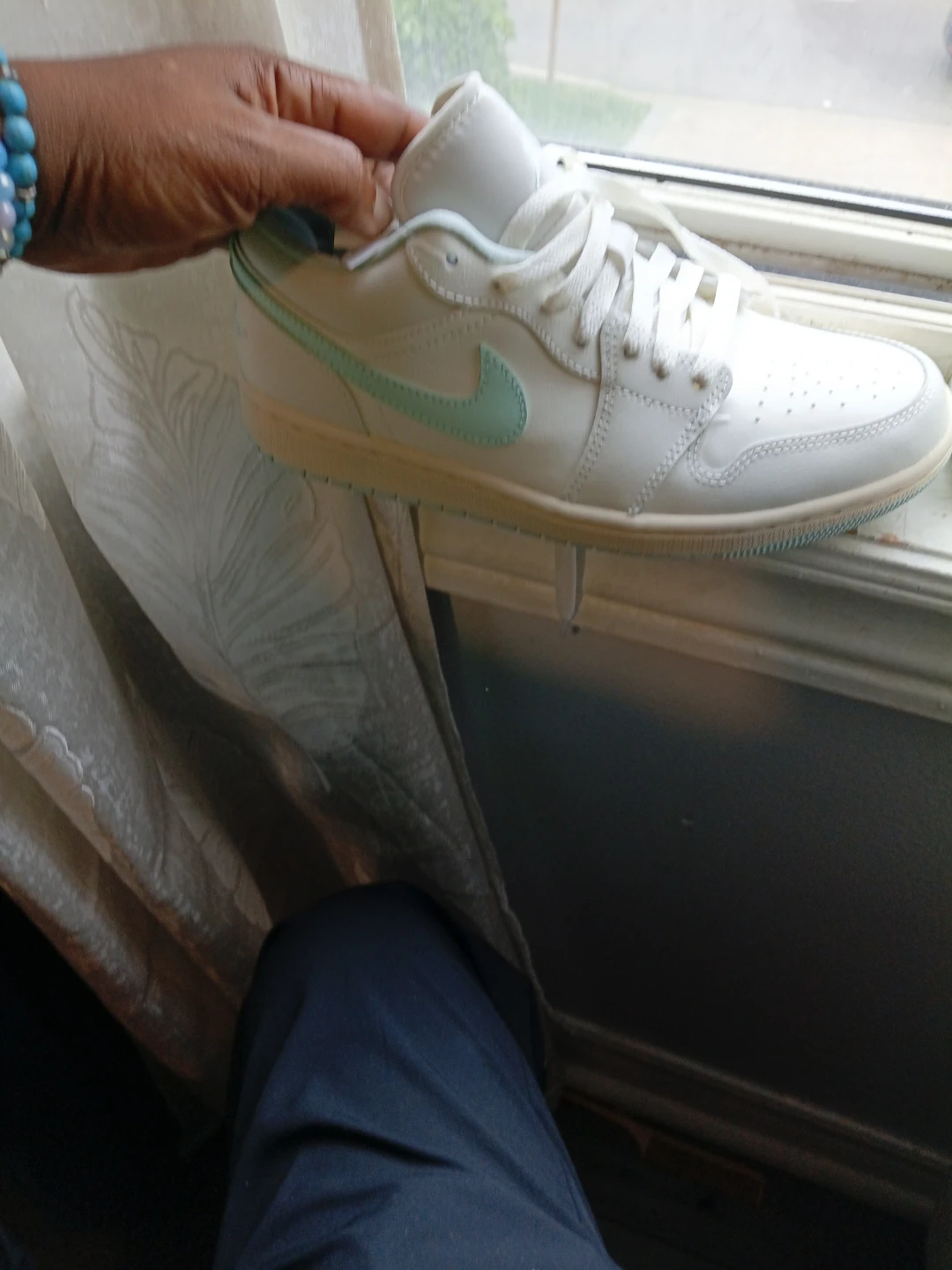 White and Teal Jordan 1 Low Sneakers