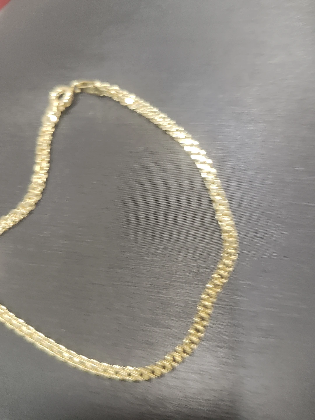 Gold tone chain necklace