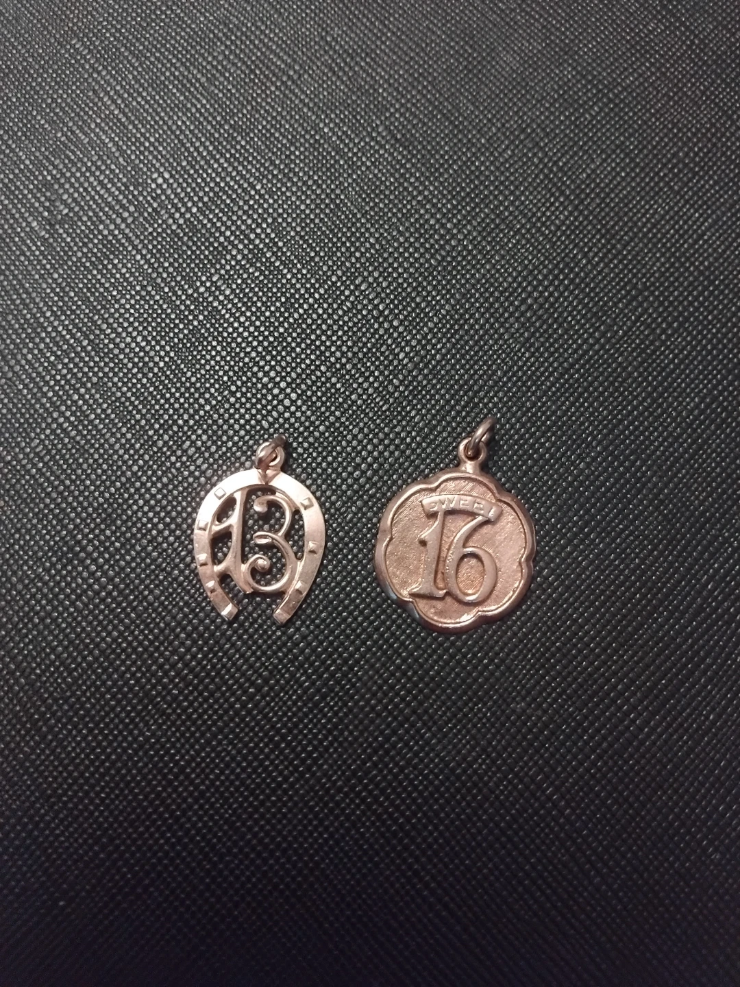 Two 10k gold charms