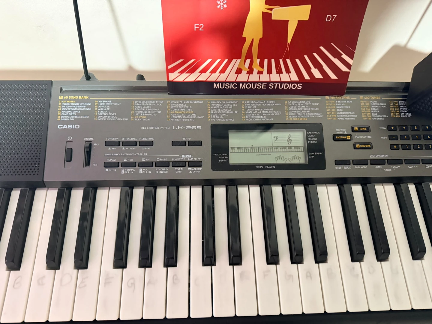 Casio LK-265 Keyboard with Stand and Music Book - photo 2