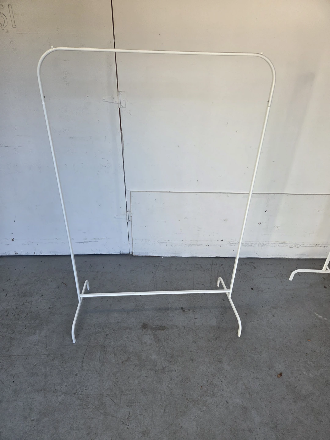 White metal clothing rack