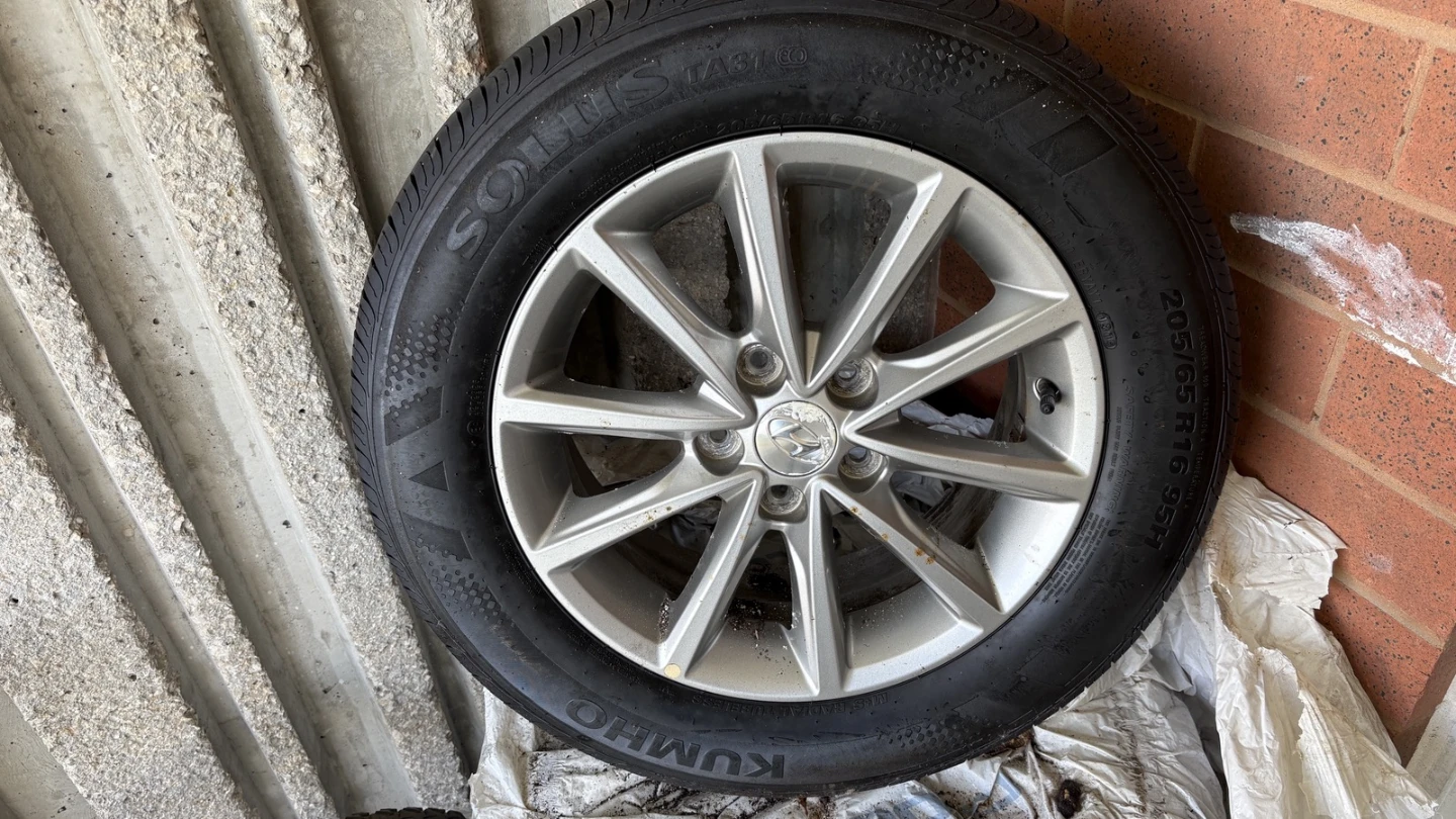 4 Kumho All-Season Tires 205/65R16 + Hyundai Alloy Rims
