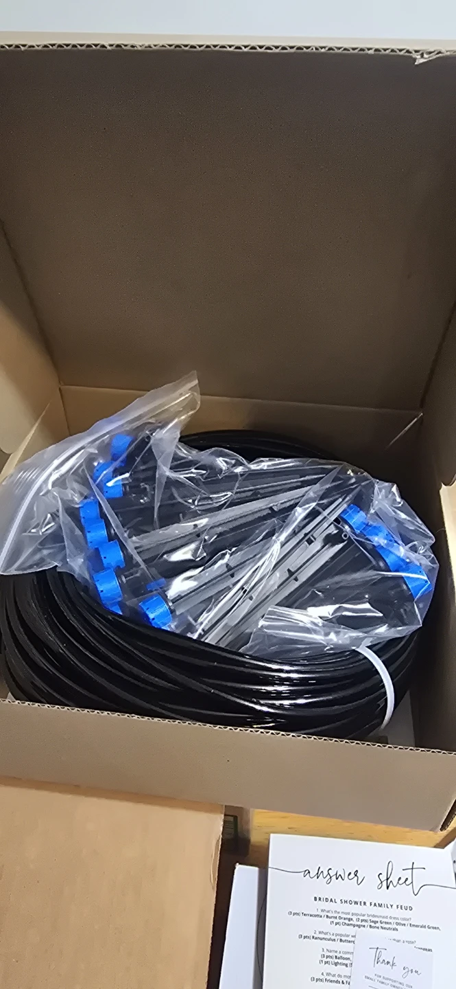 Black Drip Irrigation Tubing with Blue Connectors